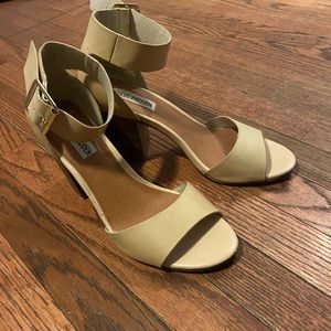 Steve Madden cream/ivory strapped heel.